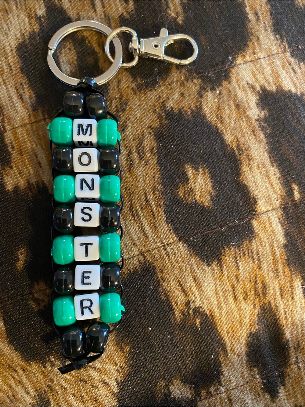 Beaded 'MONSTER' Keychain in Black & Teal